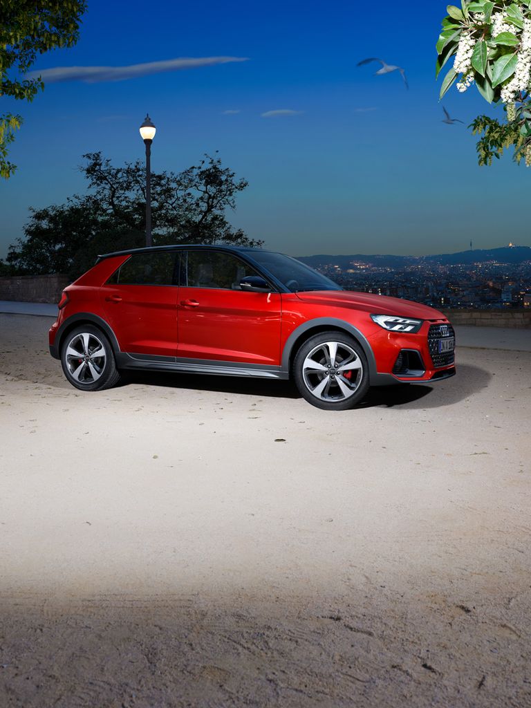 Side view of the Audi A1 allstreet in red