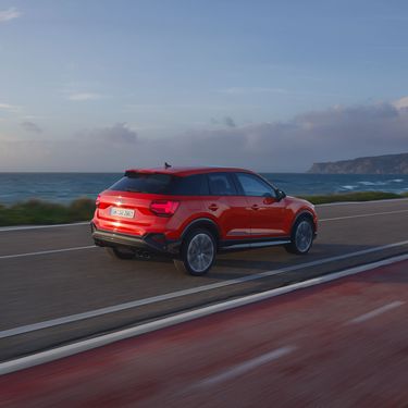 Audi SQ2 drives along the sea
