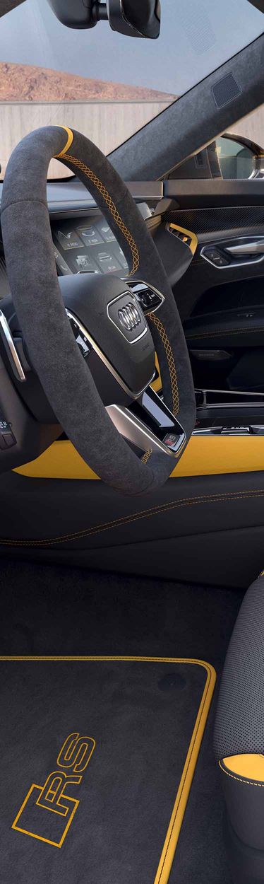 Interior view of the R8 Coupé V10 performance RWD with sports seats with yellow stitching and yellow details 