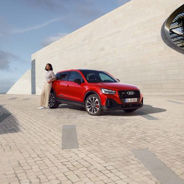 Audi SQ2 in front of wall